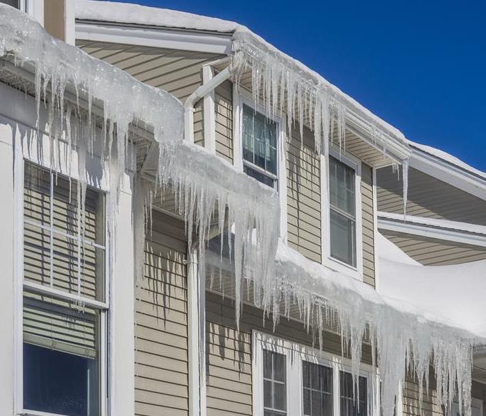 Ice dam on gutters of a home. 