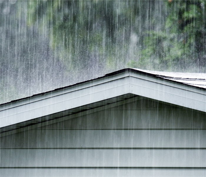 rainfall hitting the roof of a home