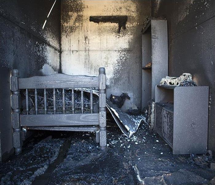 Burned Out Bed Room covered in soot
